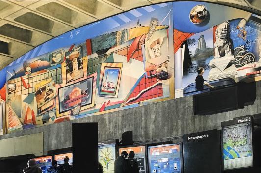 A large mural of spots around Washington DC located above the metro fare machines.