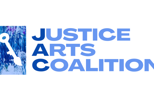 Justice Arts Coalition logo which features the white outline of a key in a blue box.