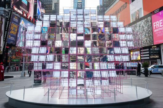 Tilted in various directions within a steel frame that evokes the outline of an anatomic heart, the 125 mirrors of Heart Squared transform the spectacle of Times Square into kaleidoscopic images of people, buildings, and brightly-lit billboards.
