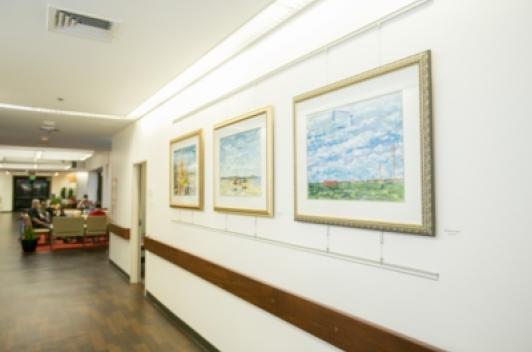 framed artwork in a hallway
