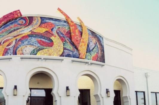 Mural mosaic art on the façade of the Casa Azafran's building