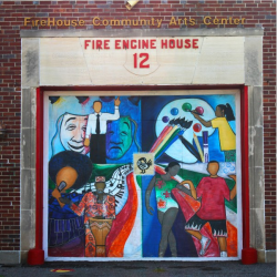Painting on the front of an old firehouse. Painting features four different scenarios, all featuring people participatin gin the arts