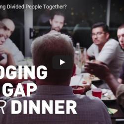 People around a dining room table with the text "Bridging the gap over dinner"