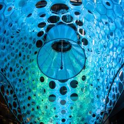 A blue structure with many holes