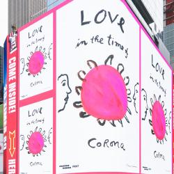 A billboard in Time Square saying 'Love in the time of Covid'
